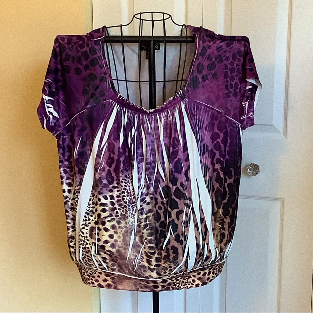 Colorful top. Excellent condition.